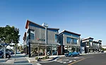 This 'urban village' of five buildings has a beachy look outside and light-filled, loftlike office spaces inside. Surfboard and bicycle storage, in addition to a spa, locker rooms, and other basement 