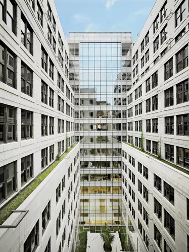 The sensitive creation of a LEED Gold landmark was achieved through such features as four green roofs, an open-air courtyard, and a new curtain wall.