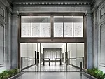 The sleek new entry and lobby echoes the architectural language established in the courtyard.