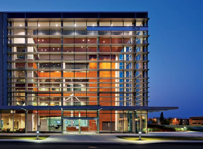 EYP replaced the former concrete factory's stalwart facade with glass panels that allow light in and views out.