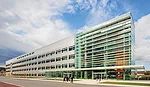 EYP replaced the former concrete factory's stalwart facade with glass panels that allow light in and views out.