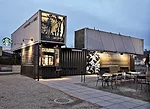 Four shipping containers were used to construct the 'Reclamation Drive-Thru' facility, which opened in December 2011 on a vacant lot in Tukwila, Washington.