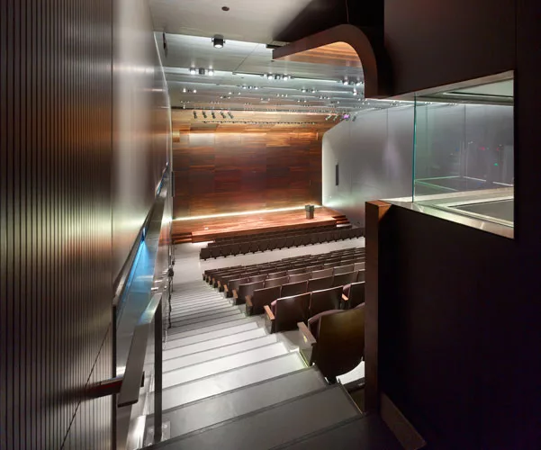 Equipped with high-end technology, the 250-seat auditorium was designed to host high-security conferences, live webcasts, and public events without interruption to the rest of the campus. 