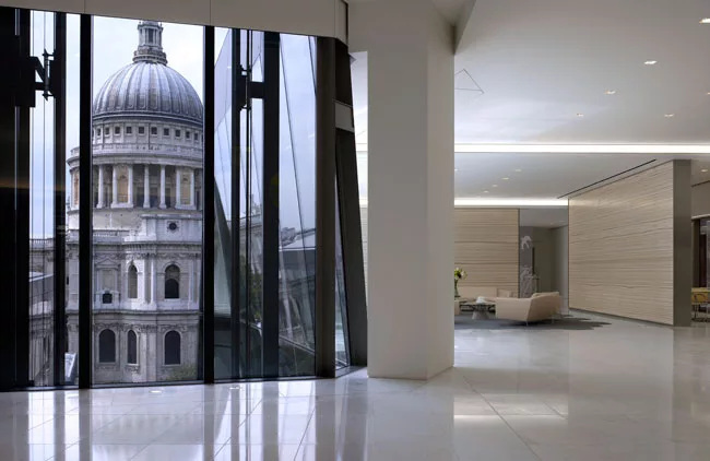 Located in Jean Nouvel's One New Change, in the City of London district, the law firm offers employees and clients stunning views of St. Paul's Cathedral from open meeting areas.
