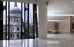 Located in Jean Nouvel's One New Change, in the City of London district, the law firm offers employees and clients stunning views of St. Paul's Cathedral from open meeting areas. 