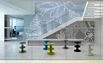 Internal stairways and contemporary  furnishings in lively gathering areas encourage staff interaction.