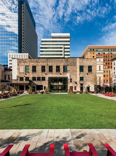 Julie Snow Architects converted two vacant storefronts—a former record store and a former Scientology center—into a lounge and recreation space for roughly 10,000 Target employees working