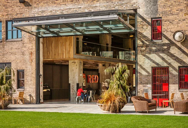 1 Vestibule<br />2 Check-In<br />3 The Bistro<br />4 Bistro Seating<br />5 Commons Hall<br />6 Fireplace<br />7 Overhead Garage Door<br />8 Lawn<br />9 Water Feature<br />10 Fire Pit<br />11 Bike Path