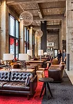 1 Vestibule<br />2 Check-In<br />3 The Bistro<br />4 Bistro Seating<br />5 Commons Hall<br />6 Fireplace<br />7 Overhead Garage Door<br />8 Lawn<br />9 Water Feature<br />10 Fire Pit<br />11 Bike Path