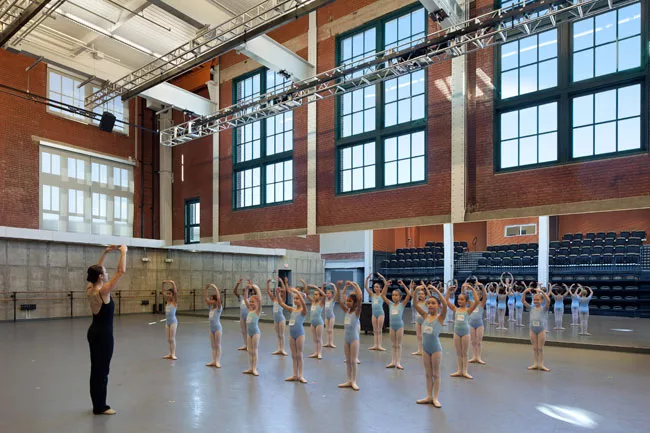 The Center includes rehearsal spaces for the company and studios for dance instruction.