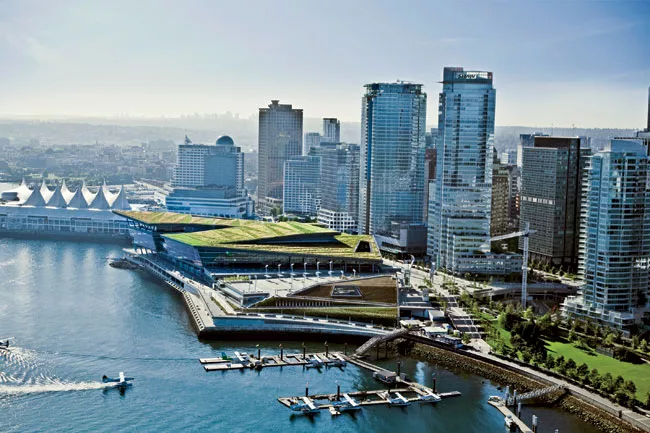 The LEED Platinum building folds seamlessly into the landscape with a 6-acre living roof that functions as a grassland ecosystem. It also extends the city’s downtown core with vibrant public spa