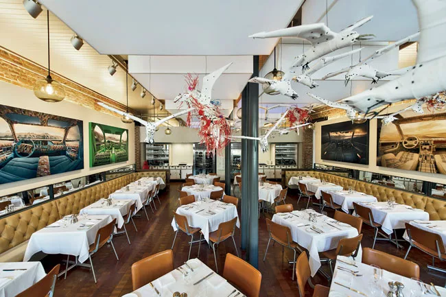 The restaurant Proof on Main 'shown here with Johnston Foster's <em>What the Flock?</em> (2012) on view'quickly became a destination in its own right when the hotel opened.