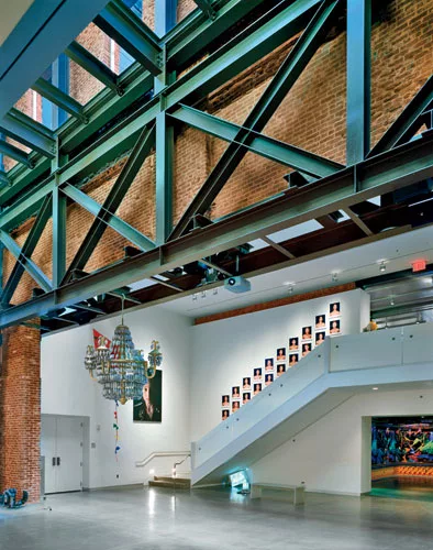 For the first 21c Museum Hotel, Deborah Berke Partners carved an atrium into a cluster of five 19th-century warehouse buildings to bring light into interior rooms and a large gallery space.