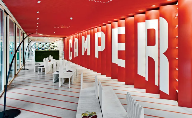 The Pritzker Prize laureate transformed a single-story 1970s building—saved from potential demolition—into a handsome “house of shoes.” Crowned by a pitched roof made of Ban&rs