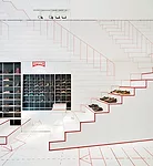 The concept for designer Jurgen Bey&rsquo;s shop in Lyon, which opened in 2011, is grounded in basic walking movements, as indicated by graphic red-on-white patterning on the ceiling, floors, and wall