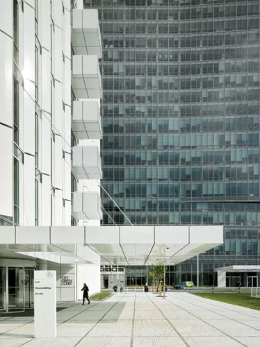 City Green Court features angled fins for sun control and an airy, daylit atrium.