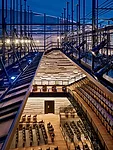 A catwalk system above the audience chamber allows access to lighting equipment.