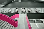 The first four levels are organized around a central atrium which features a pink-accented serpentine stair as a symbol of Rotman&rsquo;s commitment to creative thinking.