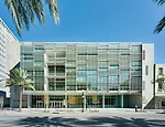  Playfully deployed louvers allow the main, southwest-facing facade to be 63 percent glass yet have the summer solar gain of a facade with only 20 percent glass.