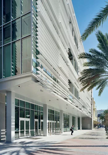 A ground-floor retail area opens to Canal Street, a major New Orleans thoroughfare.
