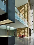 The interior atrium leads to a courtyard that is visually accessible from the street, as is typical in the French Quarter, but used only by building occupants.