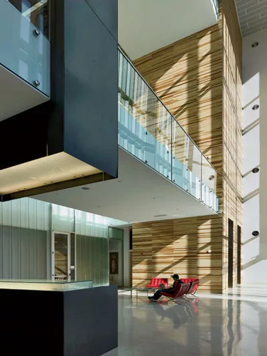 The interior atrium leads to a courtyard that is visually accessible from the street, as is typical in the French Quarter, but used only by building occupants.