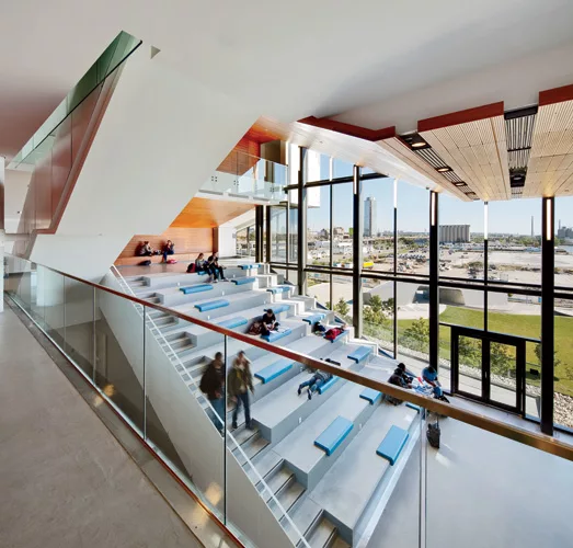 A generous stair featuring stadium seating encourages interdisciplinary exchange, and supports occasional group lectures.