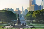 The Eakins Oval, just southeast of the Philadelphia Museum of Art, contains the Washington Monument fountain by sculptor Rudolf Siemering. The 1897 statue, moved to this site in 1928, points down the 