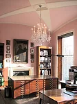 Julian Harrap Architects restored the starfish ceiling and the pink color in Number 14's first-floor library. Furnishings have been brought in from the previous library.