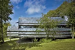 The Studio&rsquo;s designs for an extruded aluminum bench (Slide #4), writers&rsquo; cabins (Shown left), and the facade of a hospital in London (Slide #6) are similarly organic, seeming more elementa