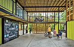 Students at Tulane's design-build program converted a former New Orleans golf course into the 4-acre Grow Dat Youth Farm, which includes a 6,000-square-foot education center made f