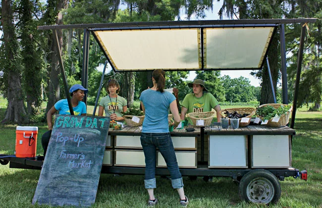 The program teaches high-school students to grow–and cook–fresh produce, and in March it added the Go Dat mobile farmstand, a converted boat trailer with a sail-like canvas roof th