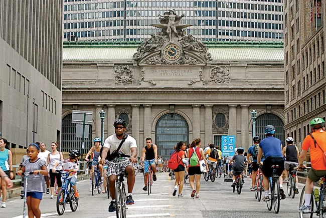 Nearly seven miles of Manhattan streets are closed to vehicular traffic for <strong>annual</strong> Summer Streets events, <strong>initiated by Bloomberg's administration in 2008.</strong>