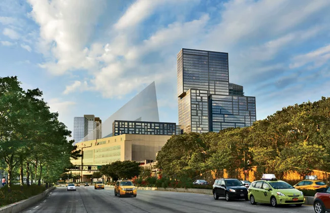 Arquitectonica’s forthcoming 606 West 57th Street (at right) in New York. The 40-story building will have 1,028 units, 224 of which will be affordable. The rendering depicts Bjarke Ingels’