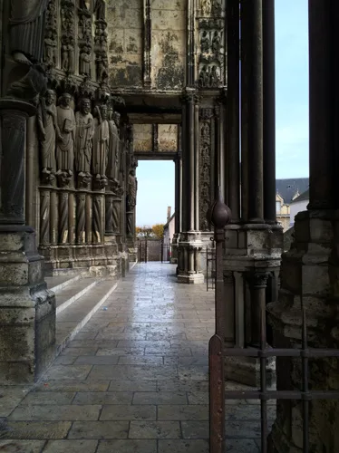 The south porch  of Chartres shows effects of age and time. Southern porch of Chartres showing effects of age and time.  Elongated figures are carved from the structural supports and maintain the inte