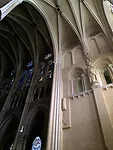 At the entry to Chartres the contrast is striking between the newly painted surfaces and the worn, bare living stone of the 13<sup>th</sup> century nave. False stone joints are painted white against t