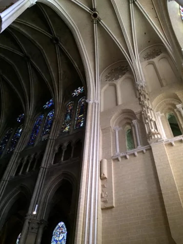 At the entry to Chartres the contrast is striking between the newly painted surfaces and the worn, bare living stone of the 13<sup>th</sup> century nave. False stone joints are painted white against t