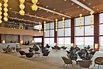 Light fixtures reminiscent of paper lanterns in the main lobby blends modern and traditional themes.