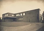 He designed and oversaw work on the Esters House (left) in Krefeld, Germany, in tandem with the adjacent Lange House (not shown) for a pair of executives of a silk-weaving mill from 1927 to 1930.