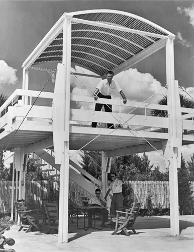 Rudolph stands on a balcony of his Sanderling Beach Club in Siesta Key, Florida, completed in 1953.