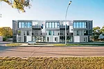 The firm designed 10 expansive condominiums for a young Winnipeg developer who wanted a project with a loftlike feel. Each apartment consists of three open-plan spaces set on separate levels. The firm