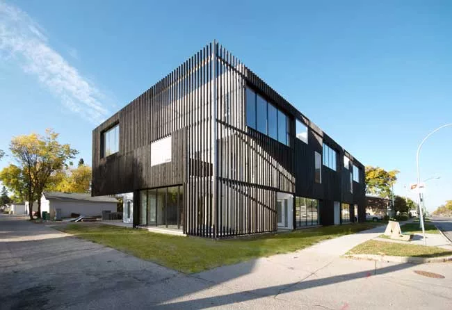 The firm designed 10 expansive condominiums for a young Winnipeg developer who wanted a project with a loftlike feel. Each apartment consists of three open-plan spaces set on separate levels. The firm