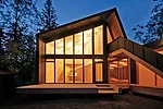 A family of four wanted to build a year-round retreat along the western shore of Lake Winnipeg, about an hour north of the city. In response, the firm designed an L-shaped house with outdoor living sp