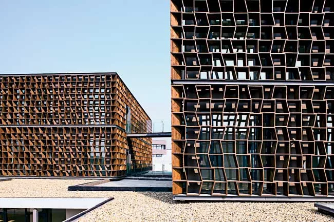 The client for this suburban office park requested it be built in a 'new Chinese style' that offered a modern story about traditional China. Many architecture firms would have responded by incorporati