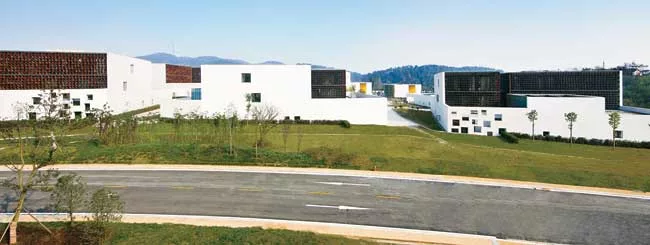 The client for this suburban office park requested it be built in a 'new Chinese style' that offered a modern story about traditional China. Many architecture firms would have responded by incorporati