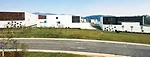 The client for this suburban office park requested it be built in a 'new Chinese style' that offered a modern story about traditional China. Many architecture firms would have responded by incorporati