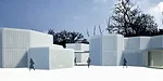 With this hotel in the middle of a wetland park, Atelier Deshaus wanted to minimize the project's impact on the site. So the firm developed a plan that evokes a cluster of cells or a group of bubbles.