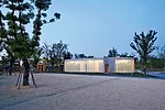 Like a Richard Serra sculpture, the building has a simple exterior hiding a complex interior and a form that unfolds as the viewer moves through it. To extend the visitor's experience at this small ga