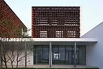The client for this suburban office park requested it be built in a 'new Chinese style' that offered a modern story about traditional China. Many architecture firms would have responded by incorporati