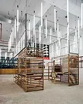 This office is on the ground floor of a 1930s harbor storage and distribution facility in Rotterdam, which stood empty for decades. The facility is now being repurposed as an incubator for startups de